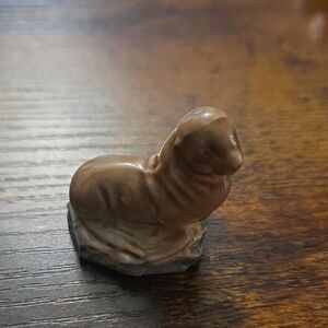 vintage Wade Whimsies seal figurine, a type of small porcelain animal figure.